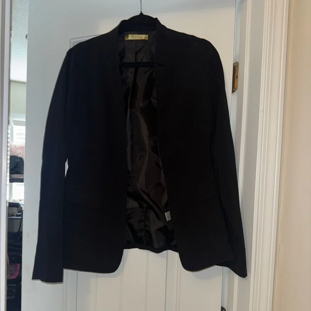 Black Blazer and Blue Jeans Outfit